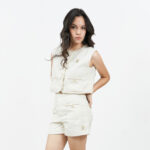 12PB URBAN BOHO เสื้อเบลาซ์ แขนกุดหน้าติดกระดุม เย็บกดเทปรอบตัว ปักโลโก้หัวกระต่ายที่อกด้านซ้าย